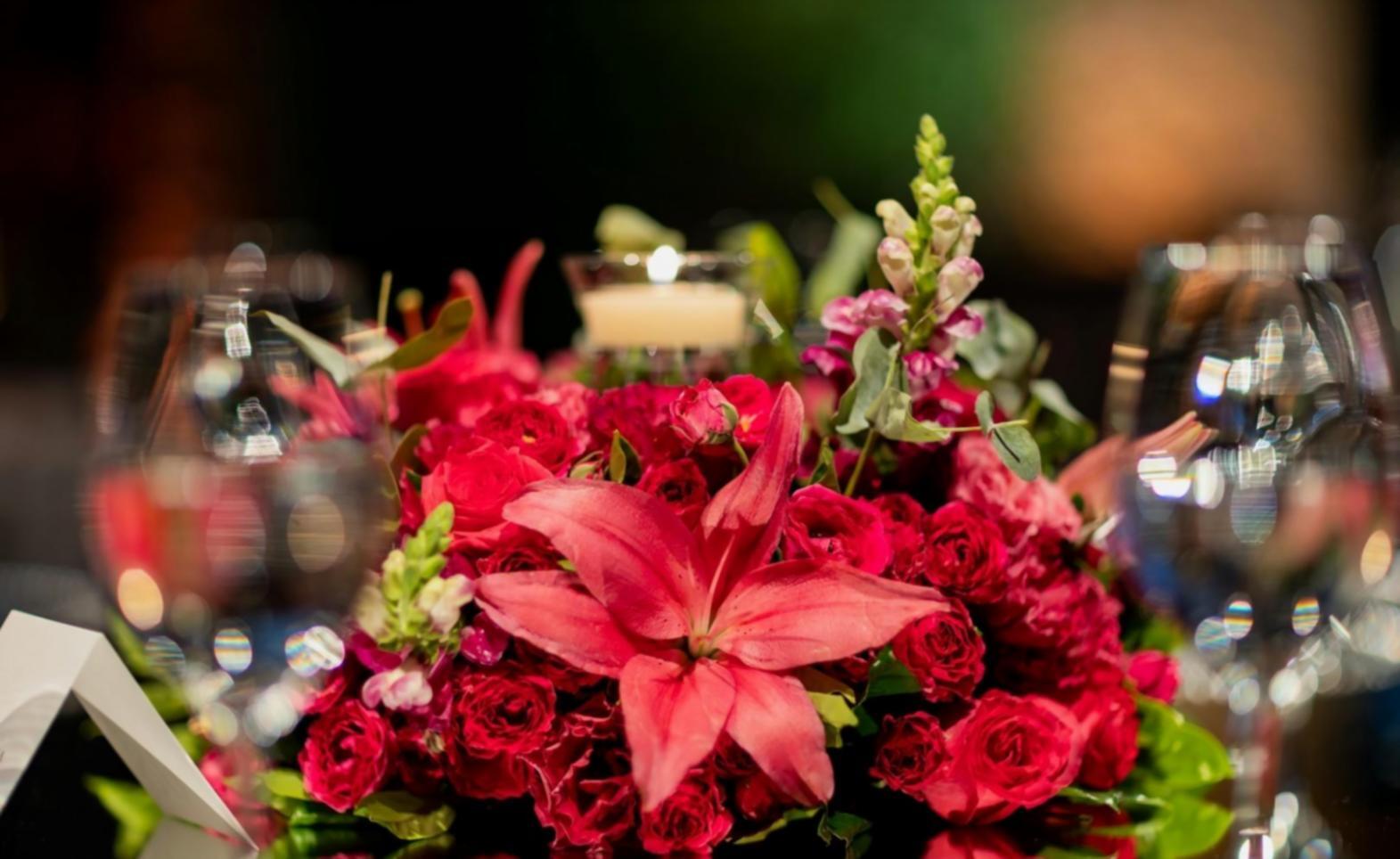 Floral arrangement being created during workshop session
